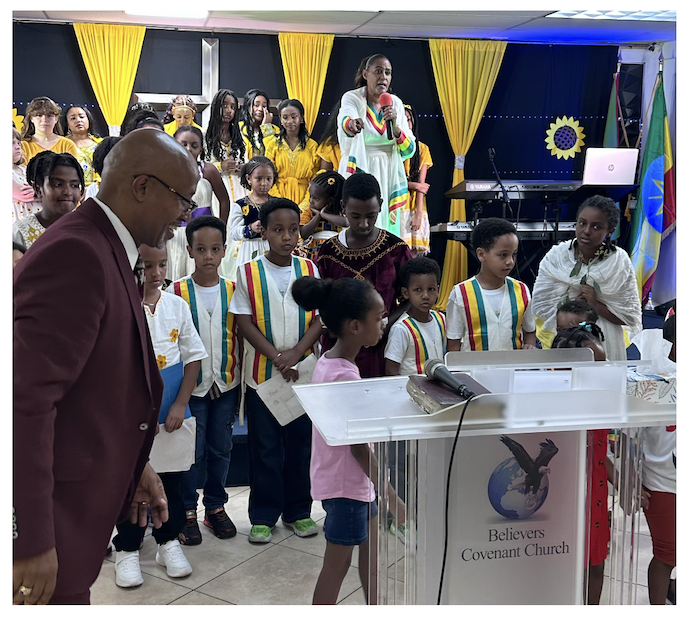 EBCC children and church leaders gathered during a community celebration